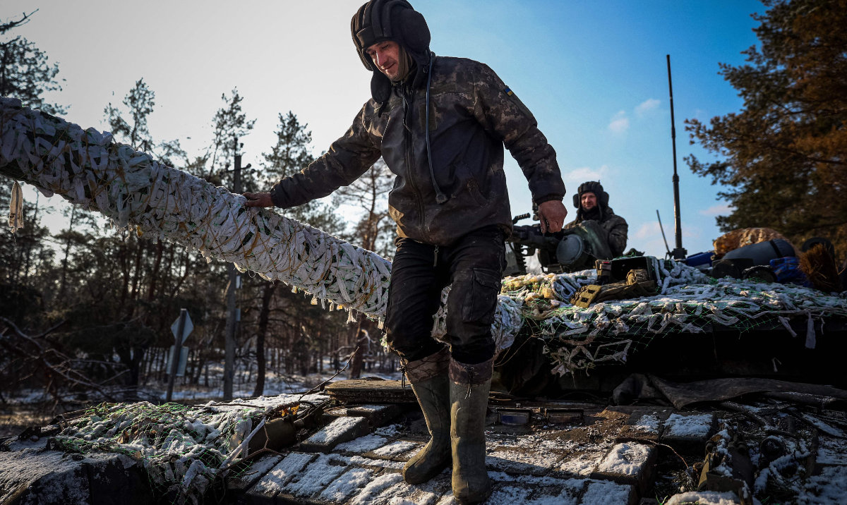 Members of a Ukrainian tank crew prepare their tank for operation in Donetsk region, on February 22, 2023, amid Russia's military invasion on Ukraine. (AFP)