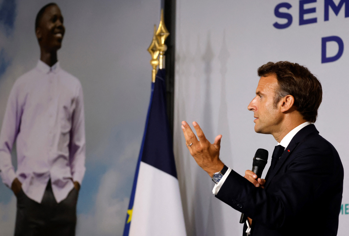 France's President Emmanuel Macron attends an event in Seme City in Cotonou during his visit to Benin in Africa on July 27, 2022. (AFP)