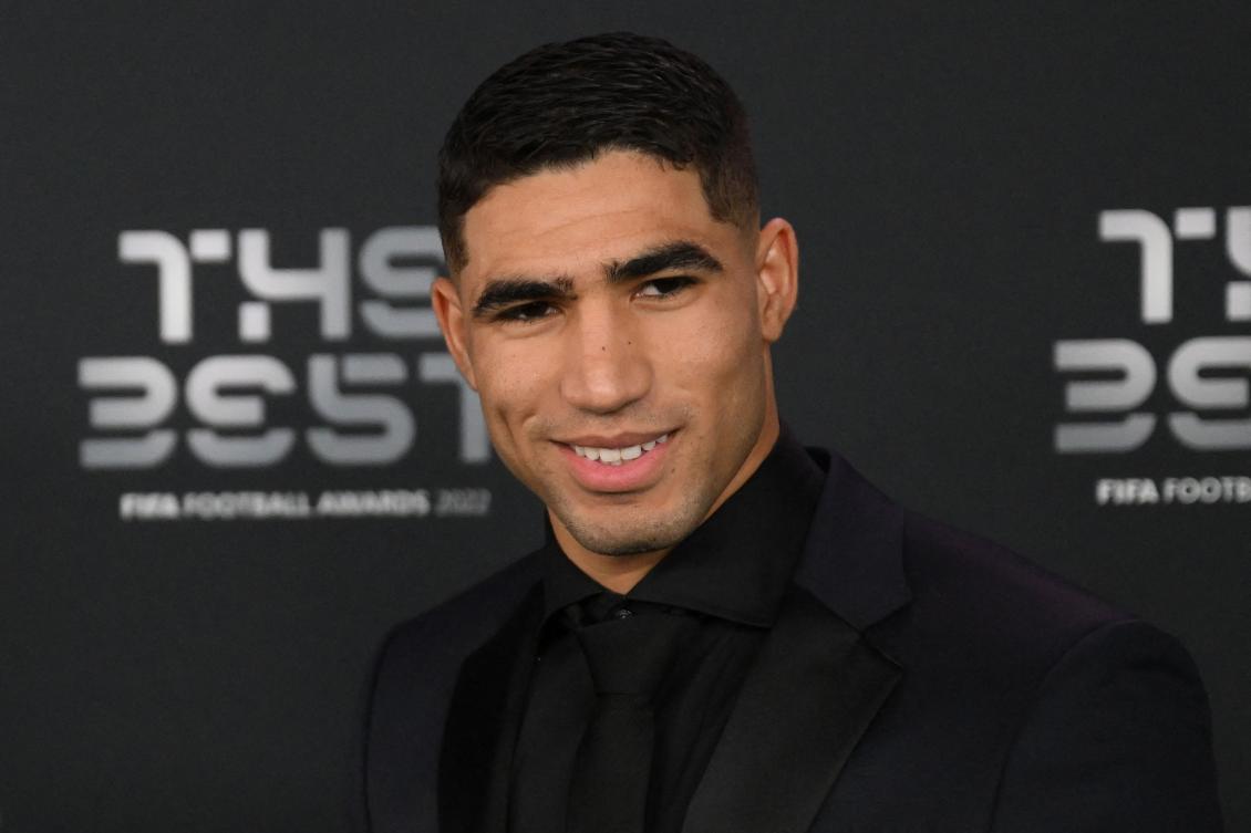 Morocco and Paris Saint-Germain defender Achraf Hakimi poses upon arrival to attend the Best FIFA Football Awards 2022 ceremony in Paris on February 27, 2023. (File/AFP)
