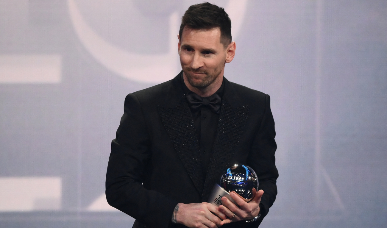Argentina and Paris Saint-Germain forward Lionel Messi poses on stage after receiving the Best FIFA Men’s Player award during the Best FIFA Football Awards 2022 ceremony in Paris on February 27, 2023. (AFP)