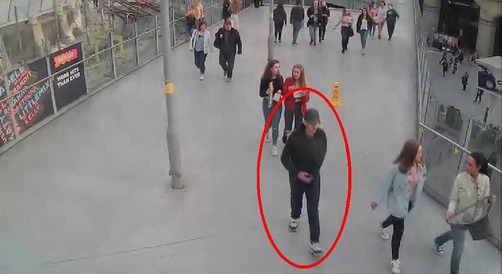 Above, a handout photo shows suicide bomber Salman Abedi walking from Victoria Station towards the Manchester Arena on May 22, 2017. Abedi killed 23 concertgoers and injured more than 1,000 others in a suicide bombing after an Ariana Grande performance. (Manchester Arena Inquiry/AFP)