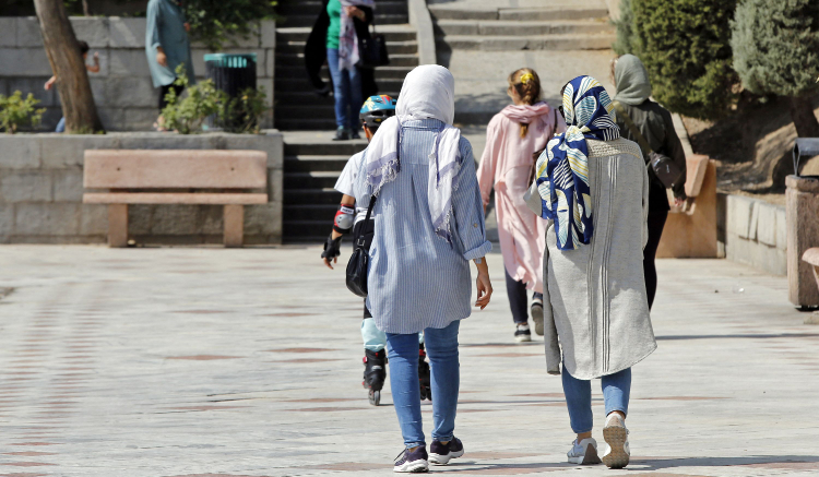 Women walk at a park in Iran's capital Tehran. (AFP file photo)