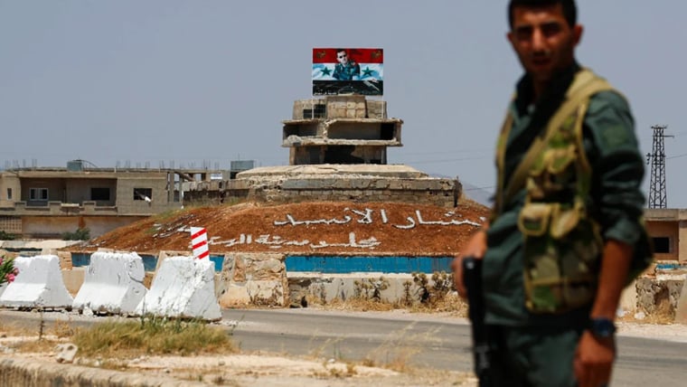 An army checkpoint on the outskirts of the central Syrian town of Rastan in Homs province. (AP Photo)
