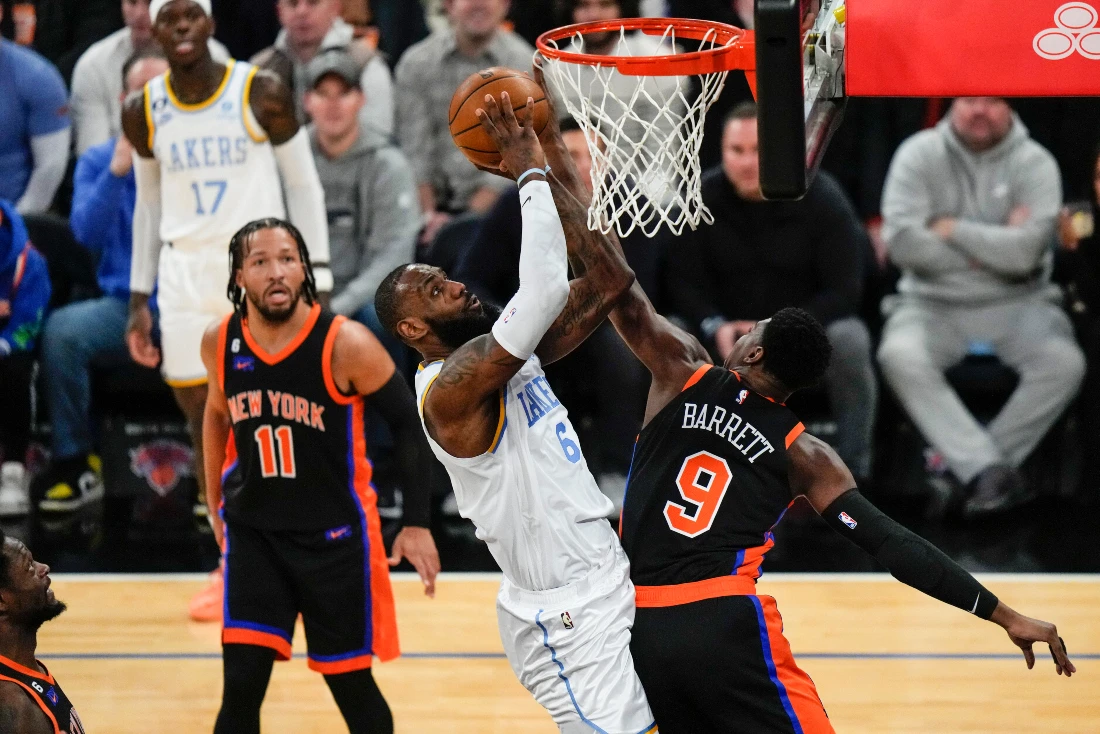James triple-double sparks Lakers to overtime victory over Knicks