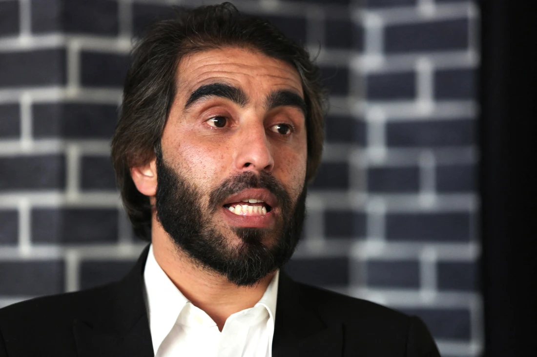 Ismail Mashal tore his academic degrees on TV after Taliban banned university education for women, vowing to campaign for women's rights. (File/AFP)