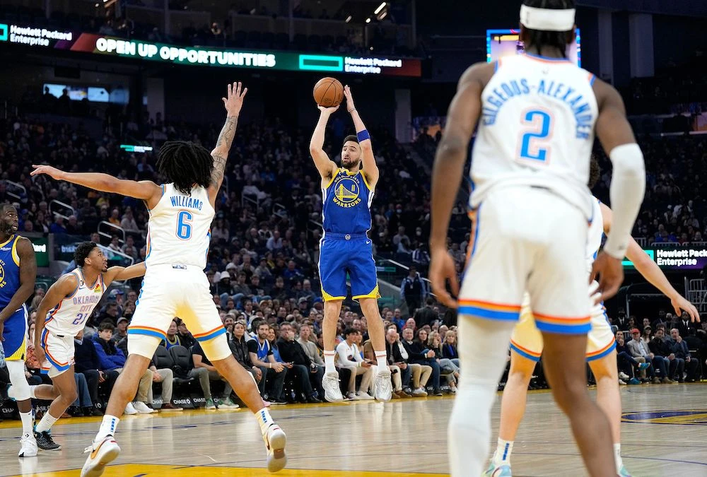 Klay Thompson of the Golden State Warriors shoots against the Oklahoma City Thunder from three-point range during the first quarter of an NBA game at Chase Center on Monday in San Francisco, California. (AFP)
