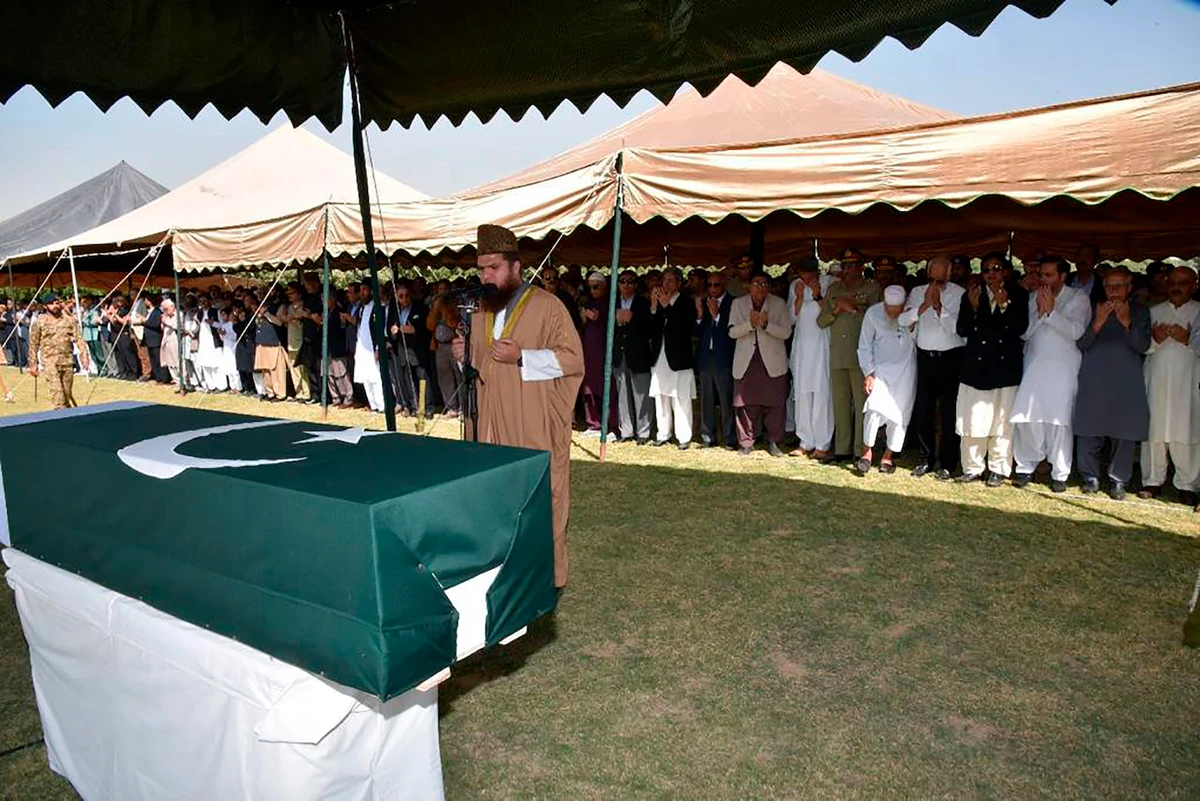 Military officials and others attend the funeral prayer of Pakistan’s former President Pervez Musharraf, in Karachi, Pakistan, Tuesday, Feb. 7, 2023. (AP)