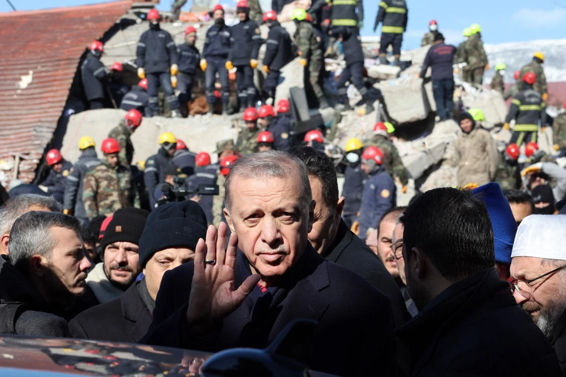 TTurkish President Recep Tayyip Erdogan tours the site of destroyed buildings during his visit to the city of Kahramanmaras in southeast Turkiye, two days after the severe earthquake that hit the region on February 8, 2023. (AFP)