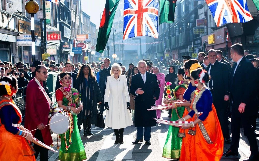 King Charles III and Queen Consort Camilla during a visit to Brick Lane in east London, England, Feb. 8, 2023. (AFP)