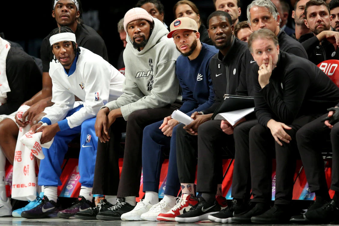 Kevin Durant (grey hoodie) is heading to the Suns. (USA Today)
