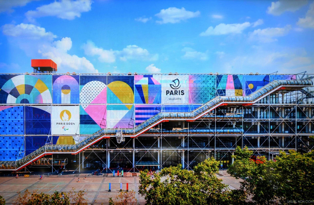 Paris Olympic organizers unveiled the 'visual identity' for the 2024 Games on February 8 including a purple athletics track and a fresh set of pictograms for Olympic sports. (AFP)