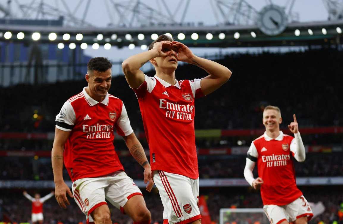 Arsenal’s Leandro Trossard celebrates scoring their first goal with Granit Xhaka during their Premier League against Brentford at Emirates Stadium, London on Feb. 11, 2023. (Reuters)