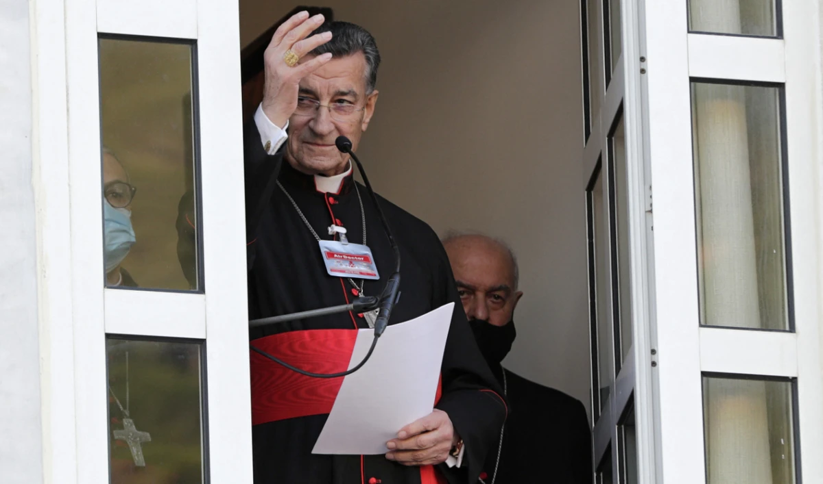Maronite Patriarch Bechara Boutros Al-Rahi greets supporters ahead of a speech on February 27, 2021. (AFP/File)