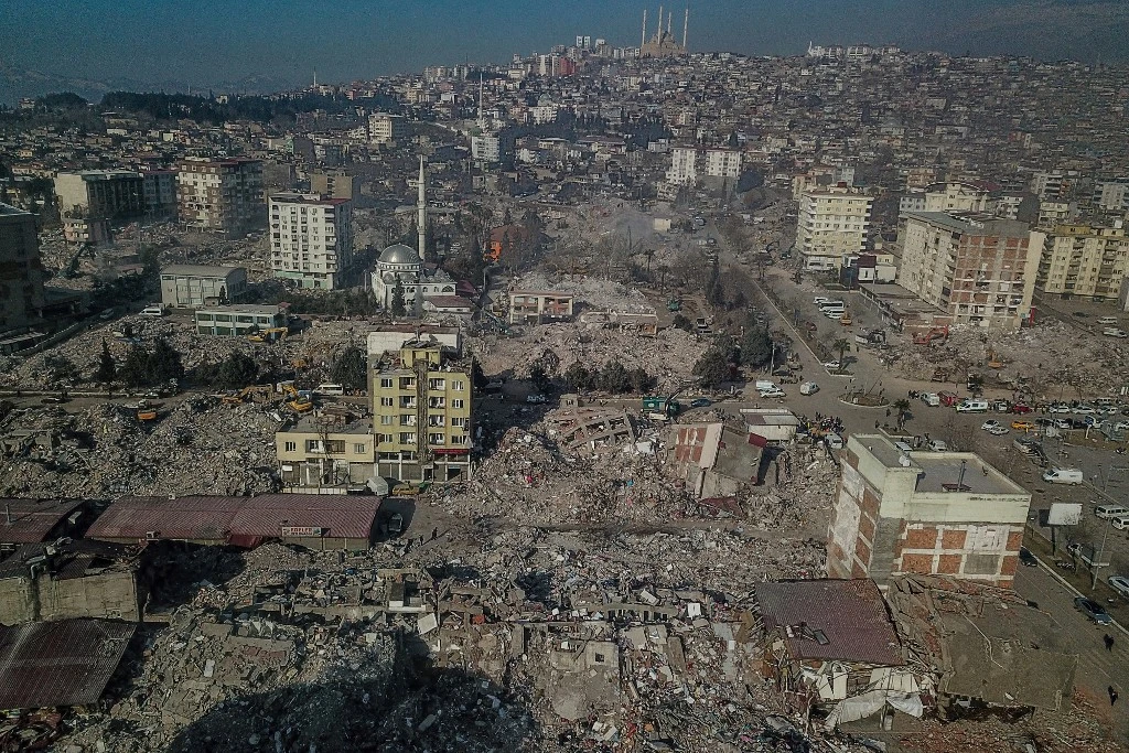 An aerial view shows collapsed buildings during ongoing rescue operations in Kahramanmaras, southeastern Turkey, eight days after a 7,8-magnitude struck. The death toll from a catastrophic earthquake that hit Turkey and Syria nears 40,000, with search and rescue teams starting to wind down their work.(AFP)