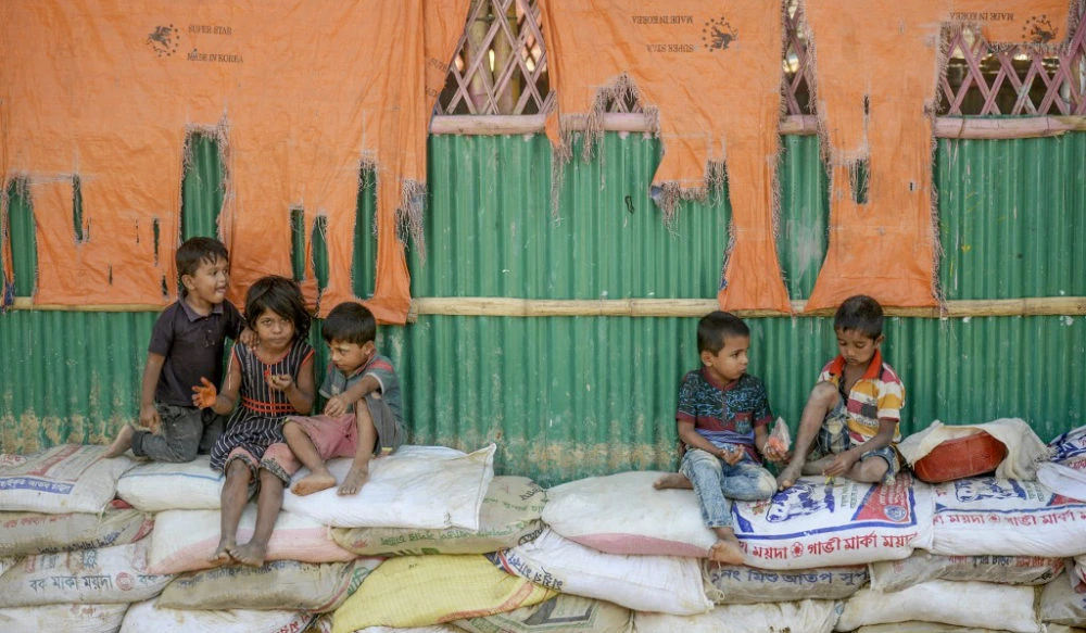 Rohingya refugee children look on as they play in Jamtoli refugee camp in Ukhia, Bangaldesh, on Dec. 11, 2019. (AFP/File)