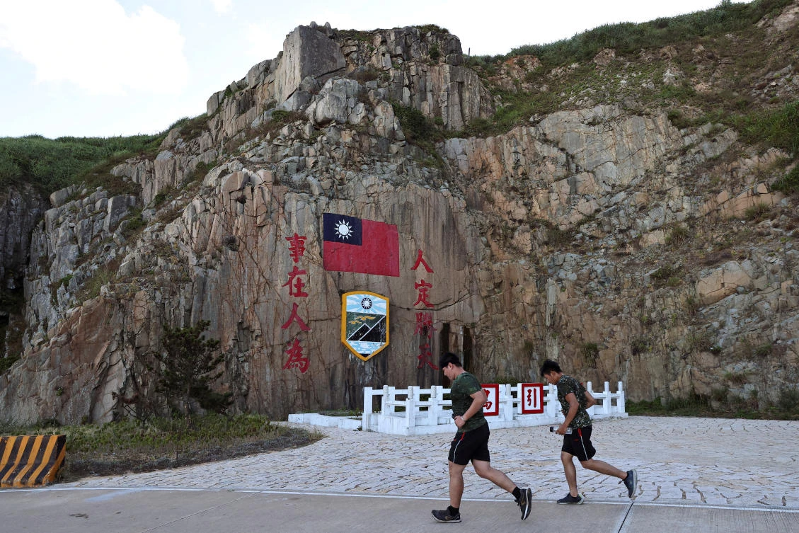 China considers Taiwan part of its territory to be brought under its control by force if necessary, and has been stepping up its military and diplomatic harassment. (Reuters)