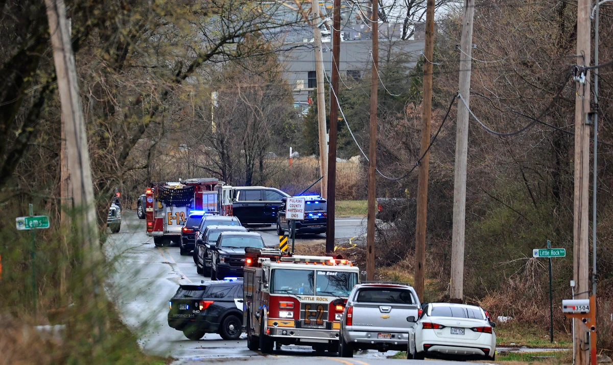Emergency vehicles appear near the location where a small aircraft crashed while taking off from the Bill and Hillary Clinton National Airport in Little Rock, Ark., Wednesday Feb. 22, 2023. (AP)