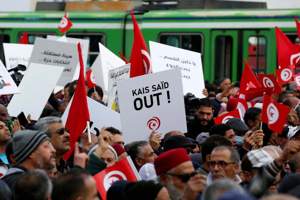 Demonstrators attend a protest against Tunisian President Kais Saied, on the anniversary of the 2011 uprising, in Tunisia on Jan.14, 2023. (Reuters/File)