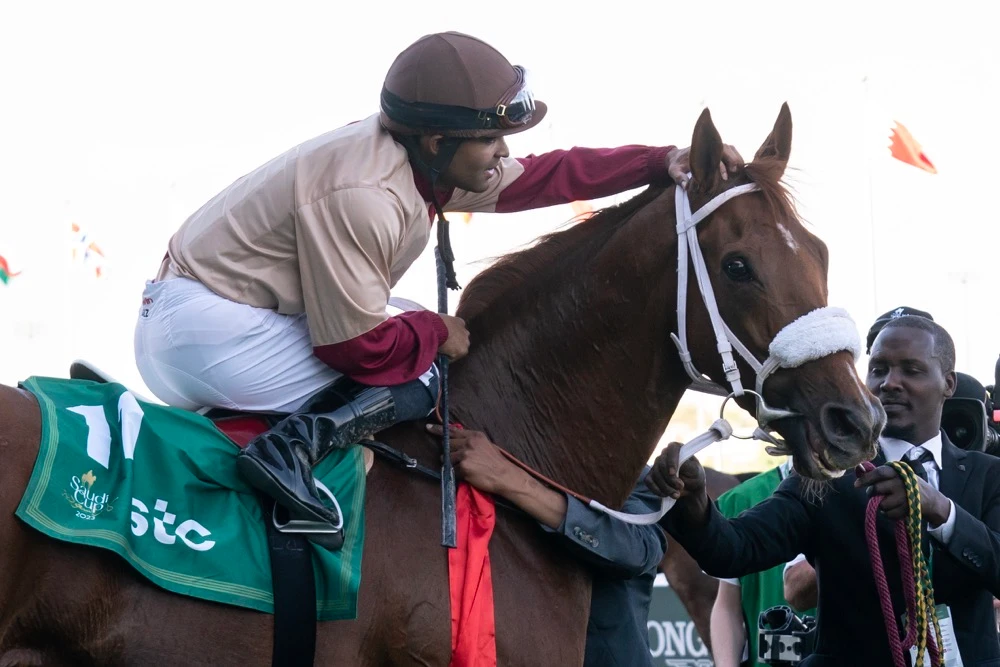 Luis Saez celebrates his win aboard Wajaab in the opening race of the International Jockeys Challenge. (JCSA/Mathea Kelley)