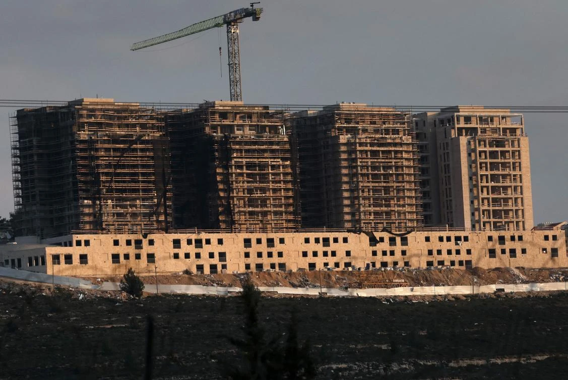 This picture taken on February 24, 2023 shows ongoing construction works in the Jewish settlement of Givat Zeev, between Jerusalem and Ramallah. (AFP)