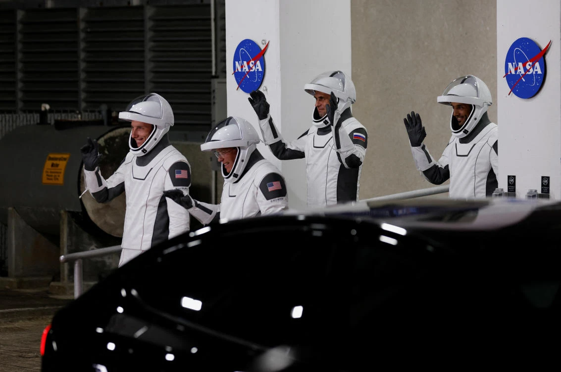 NASA astronauts Stephen Bowen and Warren Hoburg, the UAE's Sultan Al-Neyadi and Russian cosmonaut Andrey Fedyaev depart their quarters ahead of the NASA's SpaceX Crew-6 mission launch, Florida, U.S., February 26, 2023. (Reuters)