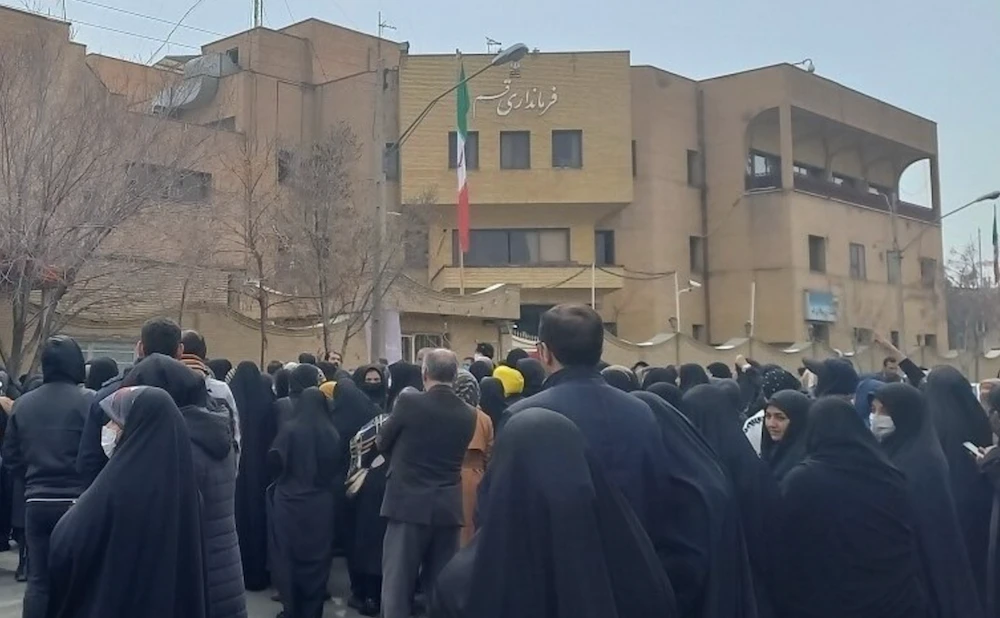 Families of the Qom students rallied outside the city governor’s office earlier this month demanding an explanation for the posionings. (Screenshot/Twitter)