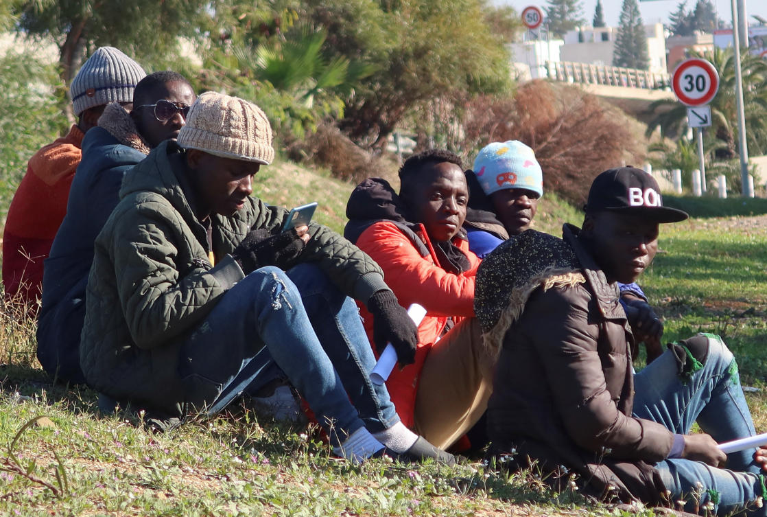 Ivorians wait near the embassy of Ivory Coast in Tunis, Tunisia February 27, 2023. (Reuters)