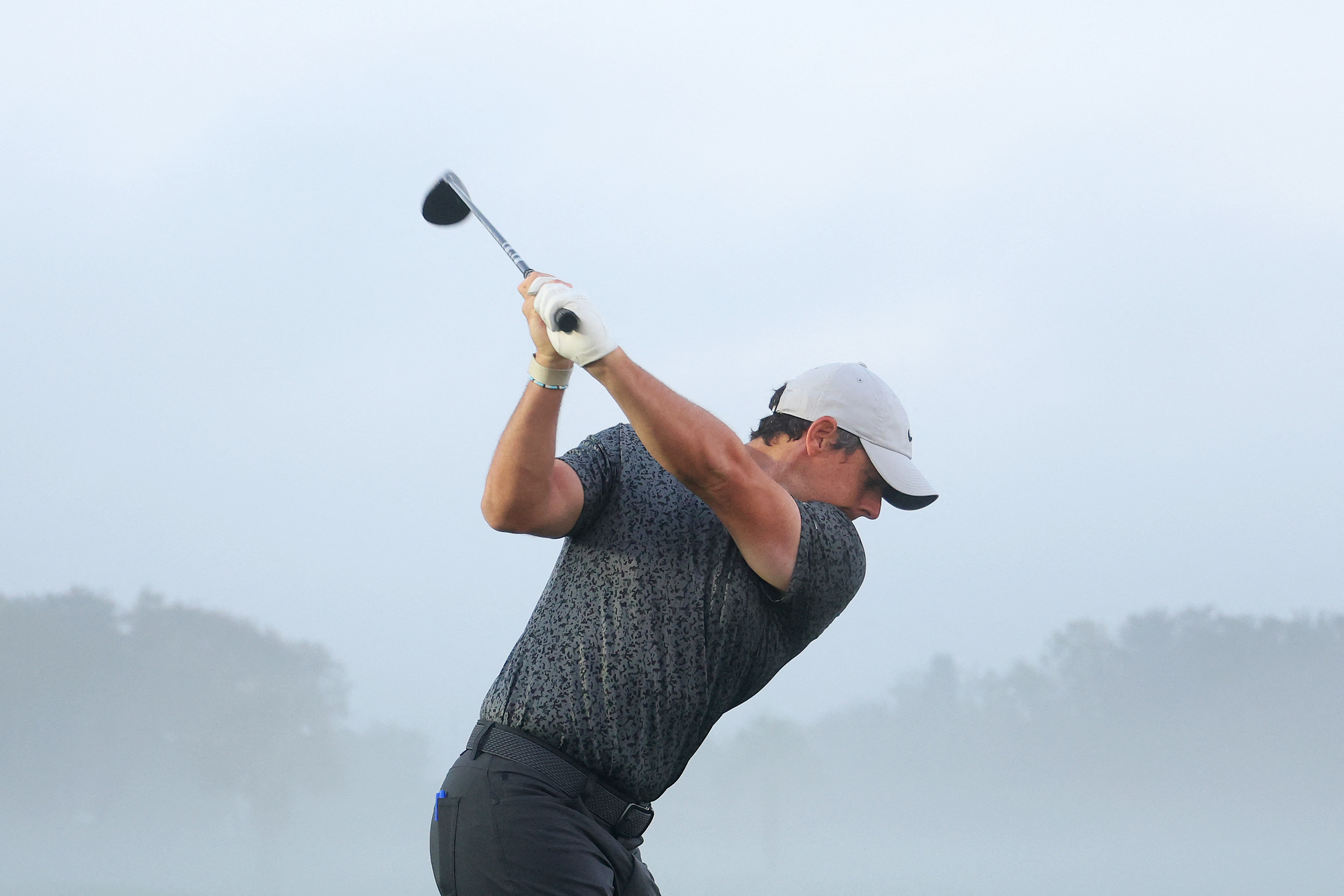 Rory McIlroy of Northern Ireland warms up on the driving range prior to the Arnold Palmer Invitational presented by Mastercard at Arnold Palmer Bay Hill Golf Course on Wednesday in Orlando, Florida. (AFP)
