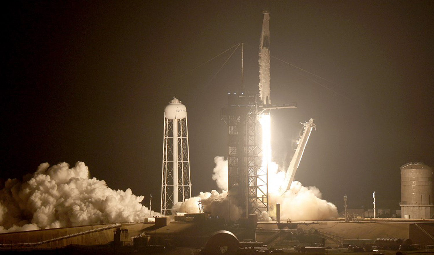 A SpaceX Falcon 9 rocket with the Crew Dragon spacecraft lifts off from launch pad 39A at the Kennedy Space Center. (AFP)