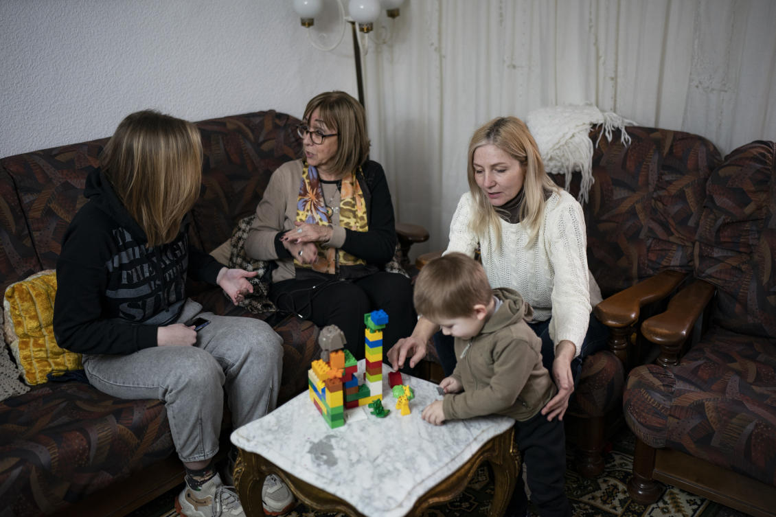 Ukrainian refugees sit in a home of a resident in the village of Guissona, Lleida, Spain, on Mar. 17, 2022. (AP/File)