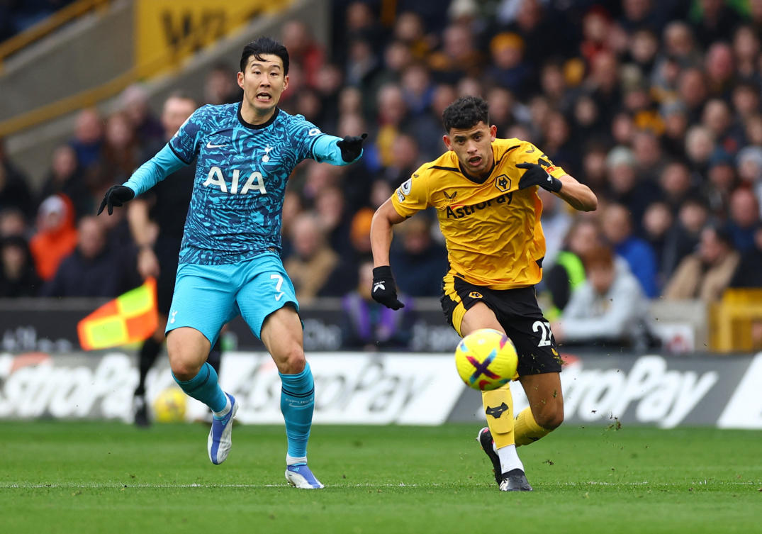 Tottenham Hotspur’s Son Heung-min in action with Wolverhampton Wanderers’ Matheus Nunes during their Premier League match at Molineux Stadium, Wolverhampton on Mar. 4, 2023. (Reuters)