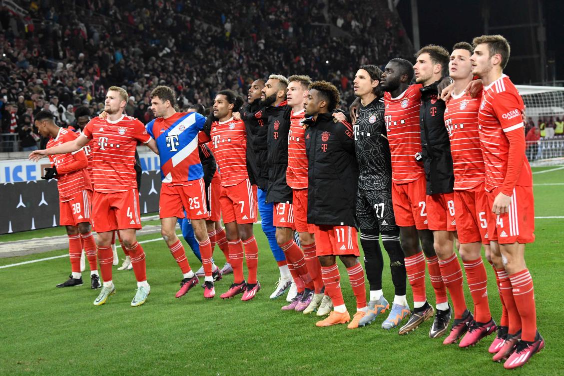 Bayern Munich players celebrate with their fans after their Bundesliga match against VfB Stuttgart in Stuttgart on Mar. 4, 2023. (AFP)