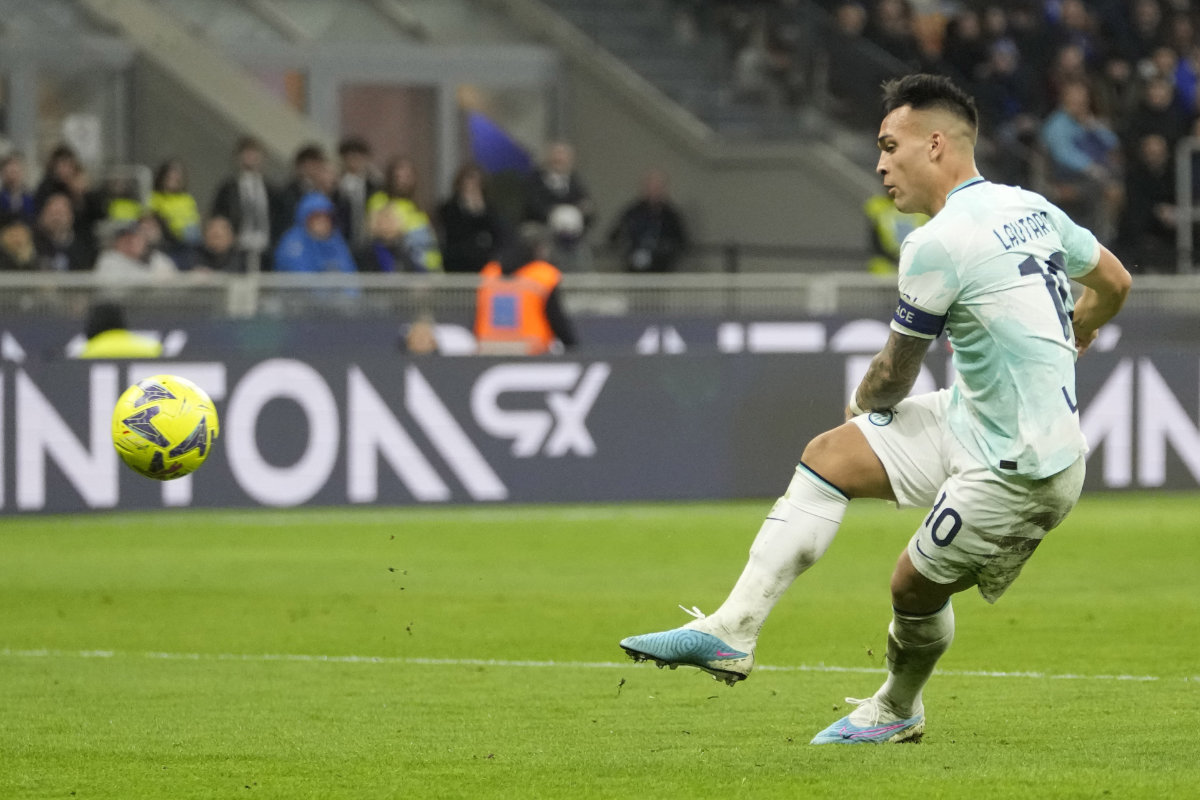 Inter Milan's Lautaro Martinez scores his side's second goal during a Serie A soccer match between Inter Milan and Lecce at the San Siro stadium in Milan, Italy, on March 5, 2023. (AP)