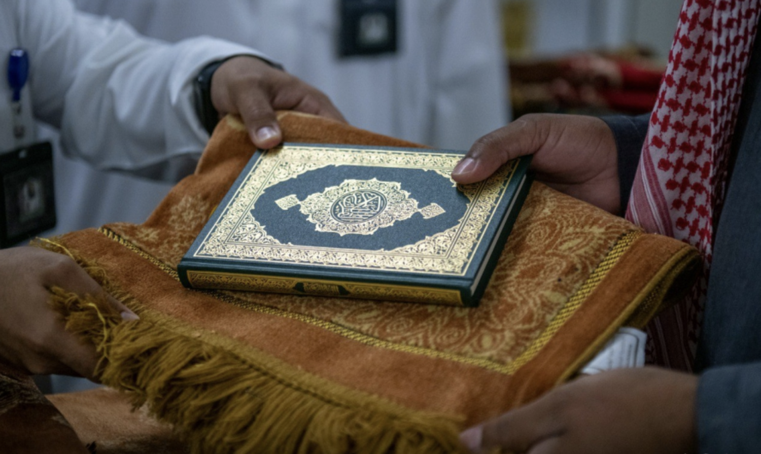 A copy of the holy Qur’an can be seen. (@ReasahAlharmain)