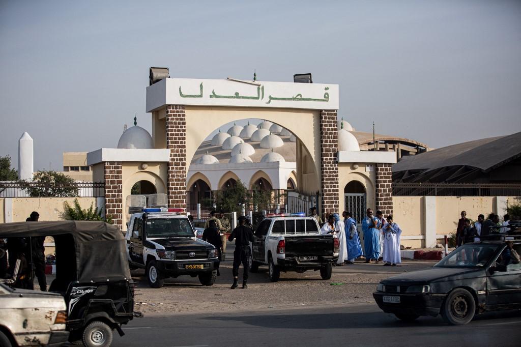 Security personal gather outside the courthouse in Nouakchott on January 25, 2023. (File/AFP)