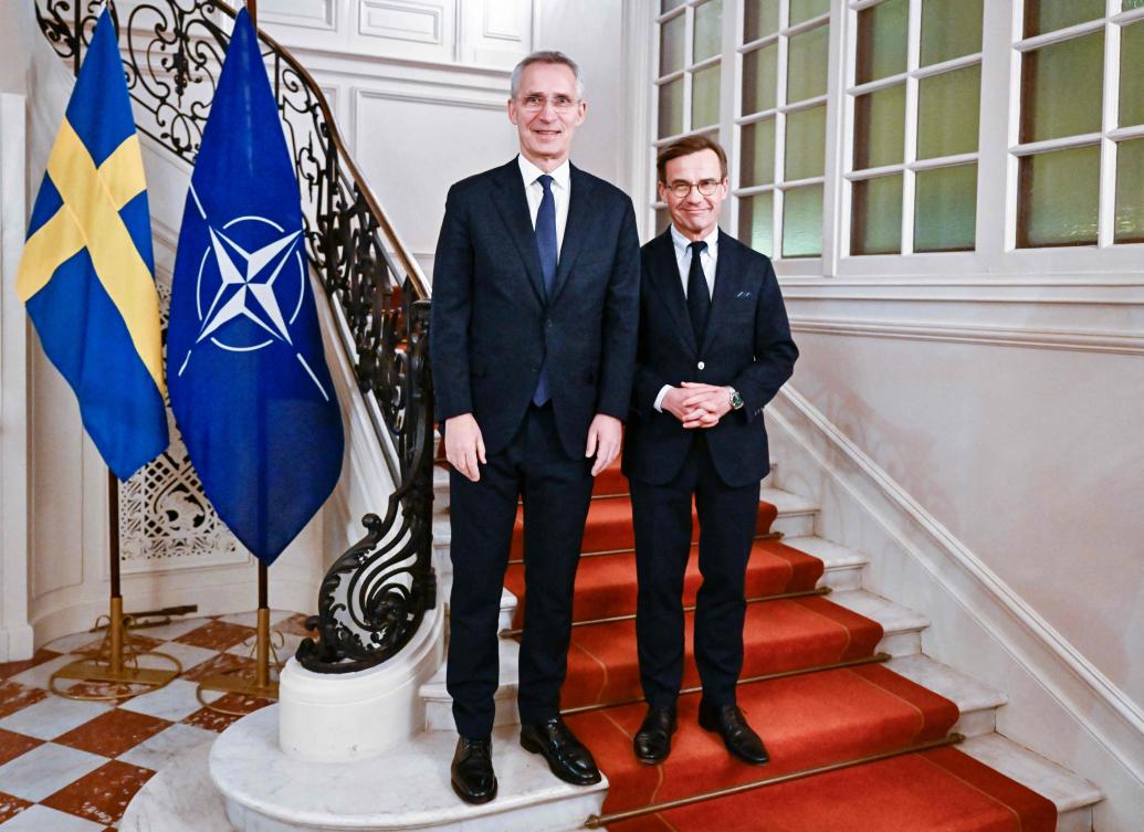NATO Secretary General Jens Stoltenberg and Swedish Prime Minister Ulf Kristersson pose after a joint press conference in Stockholm on Mar. 7, 2023, following a meeting with all Swedish party leaders who are in favor of a Swedish NATO membership. (AFP)