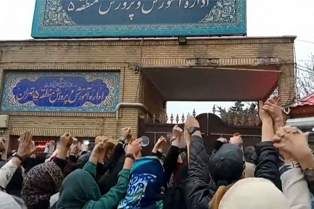 Poisoning probe after Twitter video shows schoolgirls in Iran gasping for air, forcing their way out of classrooms