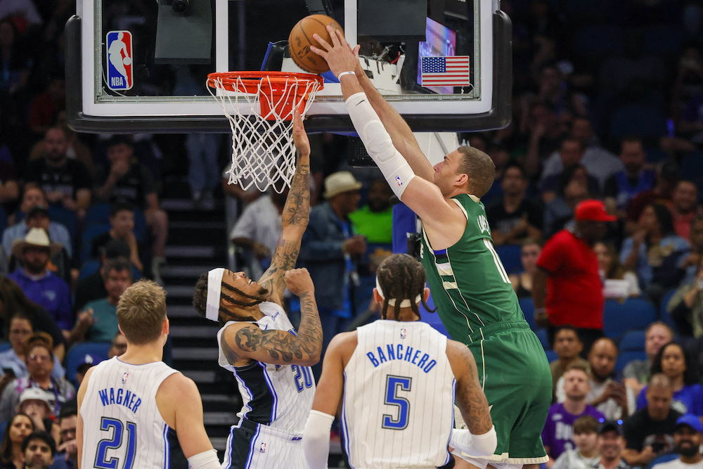 Milwaukee Bucks center Brook Lopez dunks the ball against Orlando Magic guard Markelle Fultz during the first quarter of their NBA game at Amway Center on Tuesday. (USA TODAY Sports)