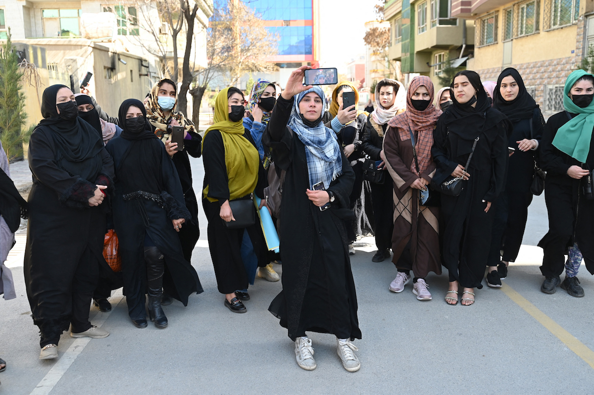 Afghan women stage a protest for their rights to mark International Women's Day, in Kabul