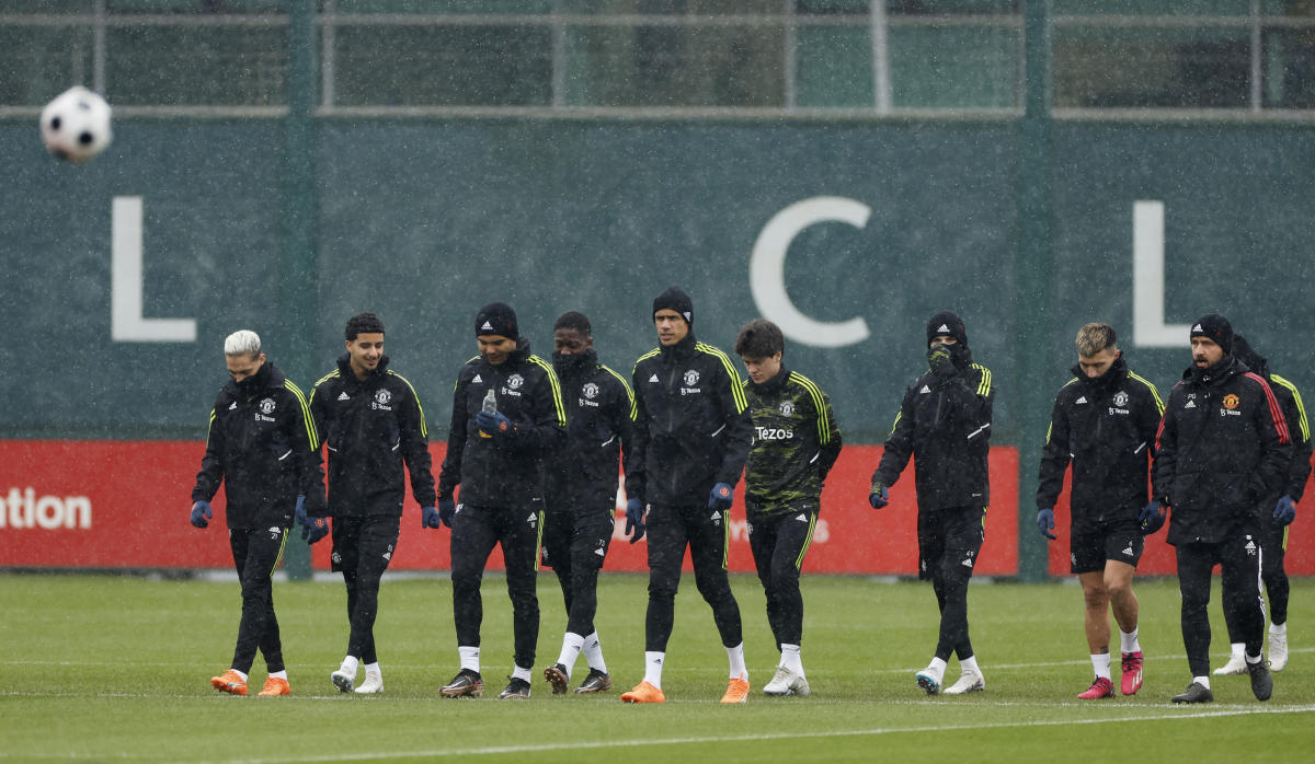 Manchester United’s Raphael Varane, Antony, Casemiro and Lisandro Martinez with teammates during training ahead of their Europa League match against Real Betis at Aon Training Complex, Carrington on Mar. 8, 2023. (Reuters)