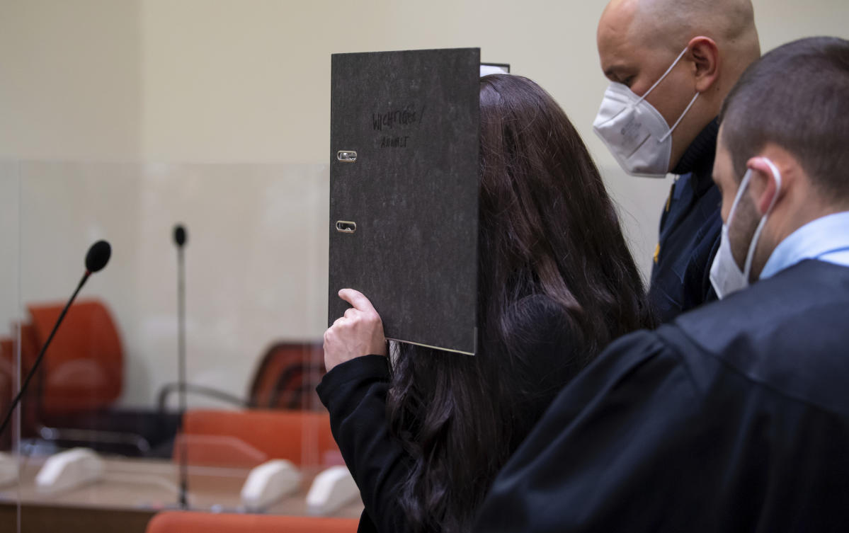 Defendant Jennifer W. arrives in a courtroom for her trial in Munich, Germany, Oct. 25, 2021. (File/AP)
