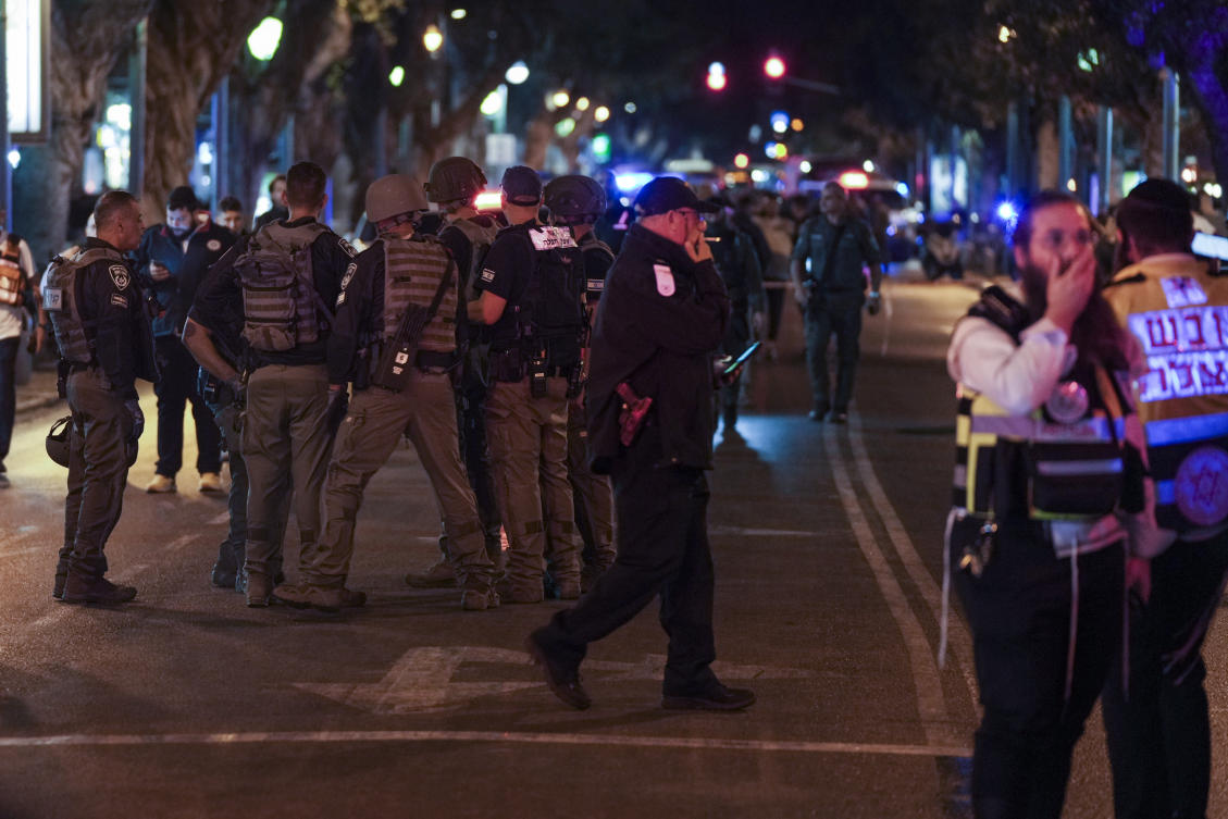 Israeli police work in a shooting attack site in Tel Aviv, Israel, on Mar. 9, 2023. (AP)