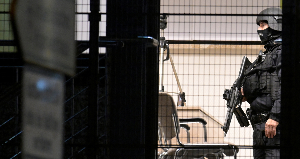 Special police inside the building in Hamburg, Germany, where several people were killed. (Reuters)