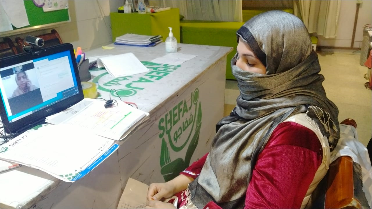 An Afghan doctor attends a teleconsultation session at Shefajo Hospital in Kabul in 2022. (EduCast)