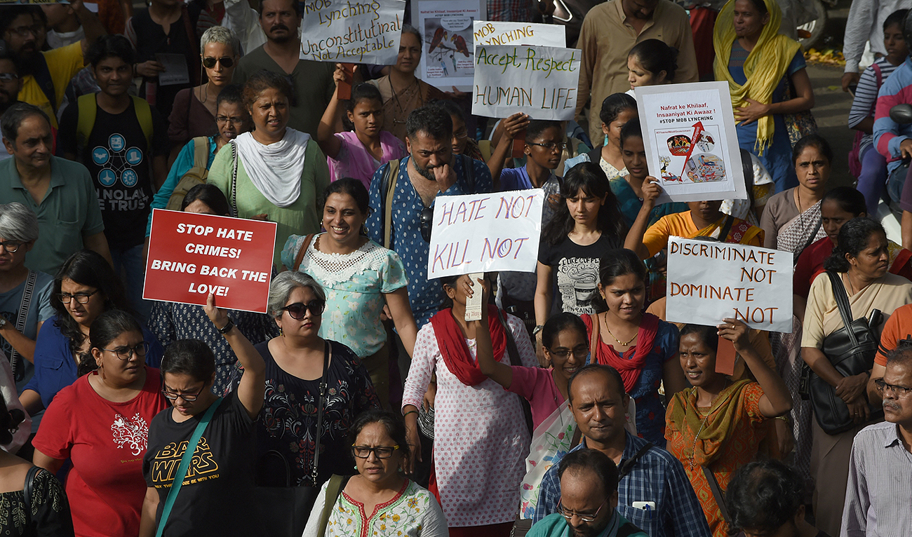 In this file photo, taken on July 3, 2017, Indian demonstrators take part in a protest against a spate of murders targeting minorities under the pretext of protecting cows in Mumbai. (Photo courtesy: AFP/File)
