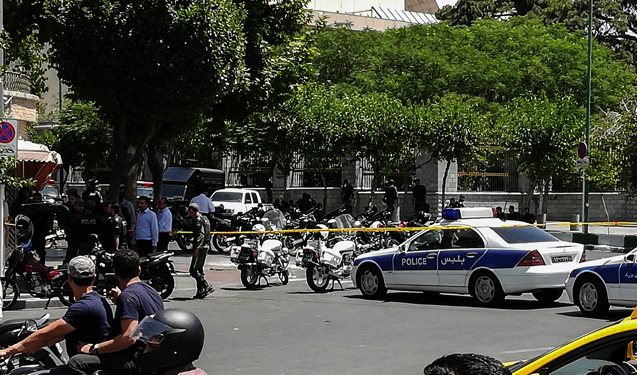 A picture taken on June 7, 2017 shows police vehicles and motorcycles outside Iranian parliament in the capital Tehran. (Photo courtesy: AFP/File)