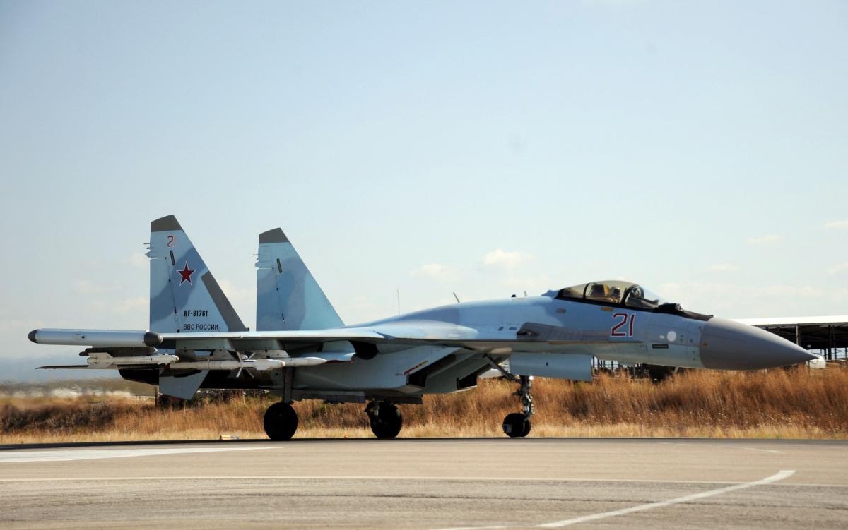 a Russian air force Sukhoi Su-35 fighter lands at the Russian military base of Hmeimim, located south-east of the city of Latakia. Iran has announced finalising the contract for purchasing advanced Sukhoi Su-35 fighter jets from Russia, state media reported as defence cooperation between the two countries deepens. (AFP)