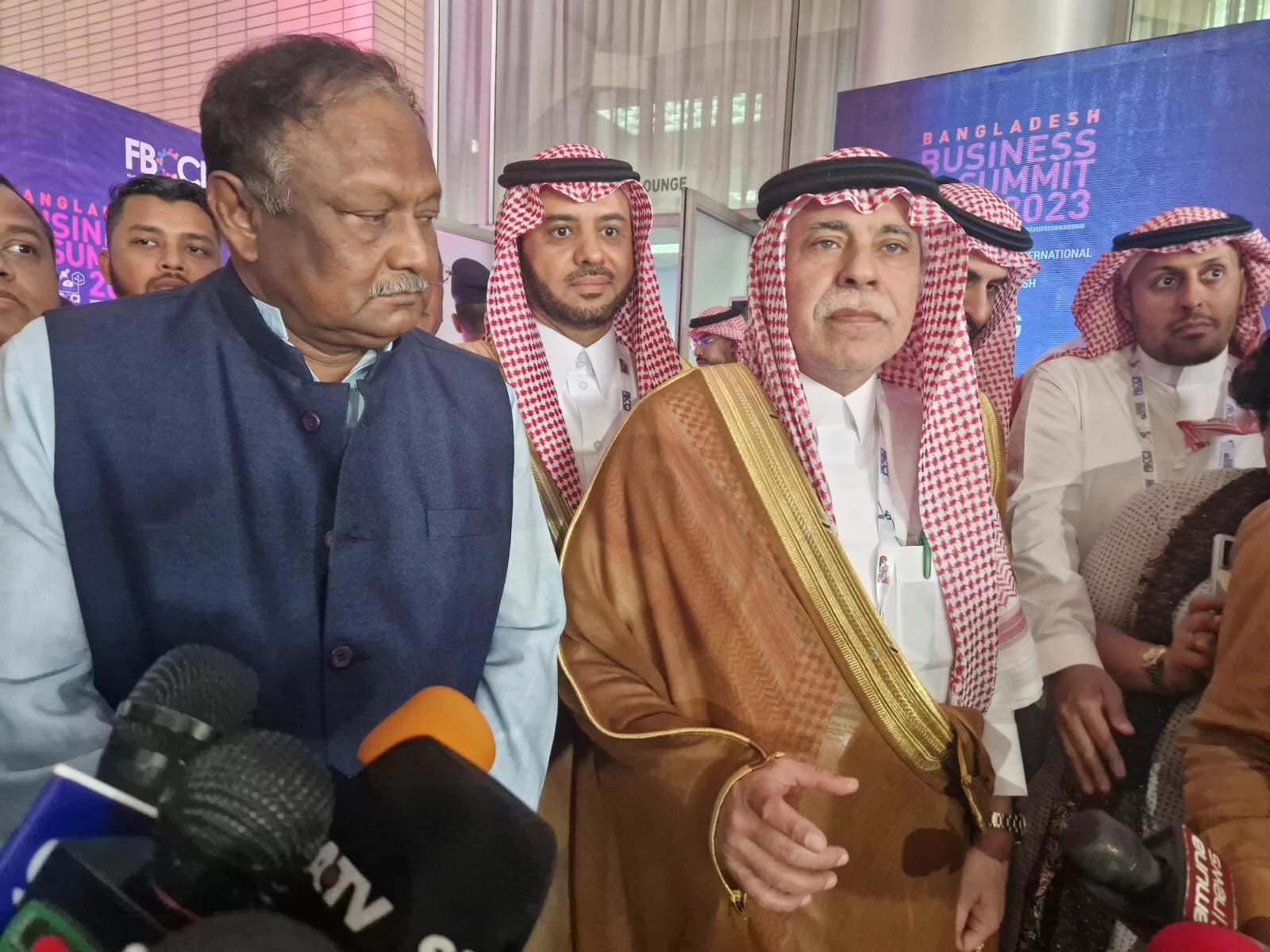 Saudi Commerce Minister Majid bin Abdullah Al-Qasabi, right, and Bangladeshi Commerce Minister Tipu Munshi talk to reporters during the Bangladesh Business Summit 2023 in Dhaka on March 11, 2023. (AN Photo)