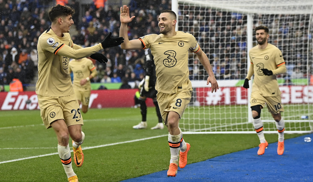 Chelsea's Croatian midfielder Mateo Kovacic (C) celebrates scoring the team's third goal during the English Premier League match between Leicester City and Chelsea at King Power Stadium in Leicester, central England on Saturday. (AFP)