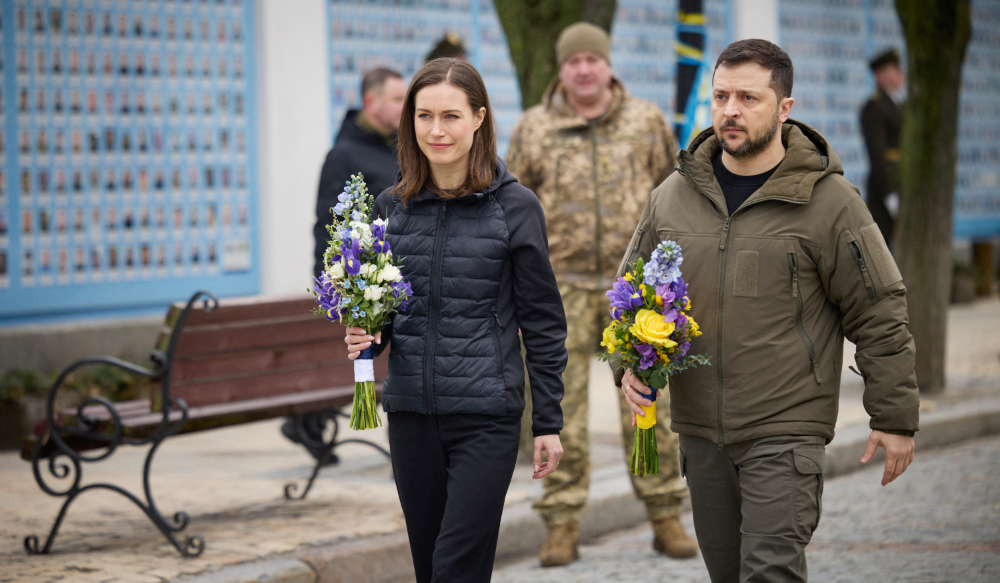 Ukraine's President Volodymyr Zelenskiy and Finnish Prime Minister Sanna Marin visit the Wall of Remembrance to pay tribute to killed Ukrainian soldiers, amid Russia's attack on Ukraine, in Kyiv, Ukraine March 10, 2023. (REUTERS)